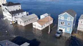 Drone video shows floodwater surrounding New Hampshire homes