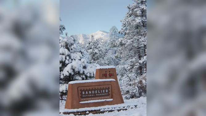 Snow covers an entrance to Bandelier National Monument.