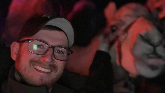 A Grant County Sheriff's Office deputy and a camel from the Shrine Circus after the animal was rescued from a trailer fire in Indiana.