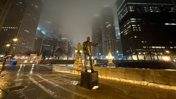 Ice is seen on sidewalks and walkways in Chicago on Tuesday, Jan. 23, 2024.