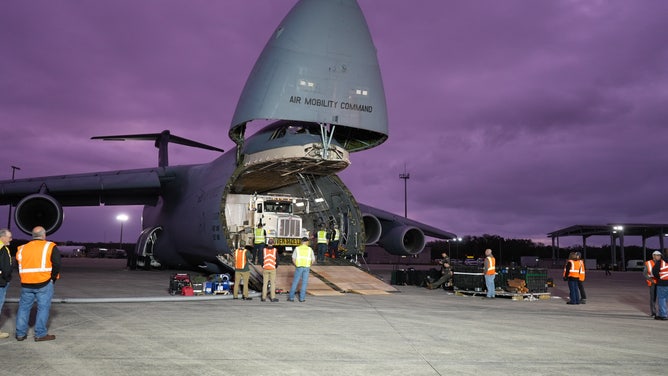 The GOES-U satellite is unloaded from a C-5M Super Galaxy cargo transport plane at Kennedy Space Center's Launch and Landing Facility in Florida on Jan. 23, 2024.