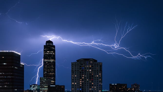 FILE - Lightning strikes the sky above the city of Houston, Texas, the United States, June 21, 2023.