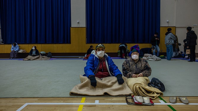 Local people get evacuated to the shelter at Joetsushi Total Gymnastics on January 01, 2024 in Joetsu, Japan. 