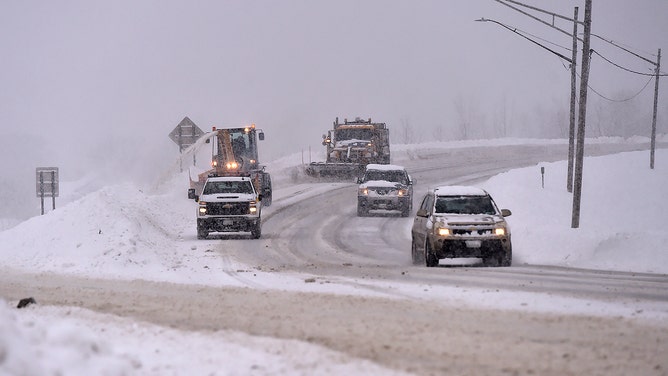 Snowplows work to remove snow along Lakeshore Road on January 18, 2024 in Lackawanna, New York.