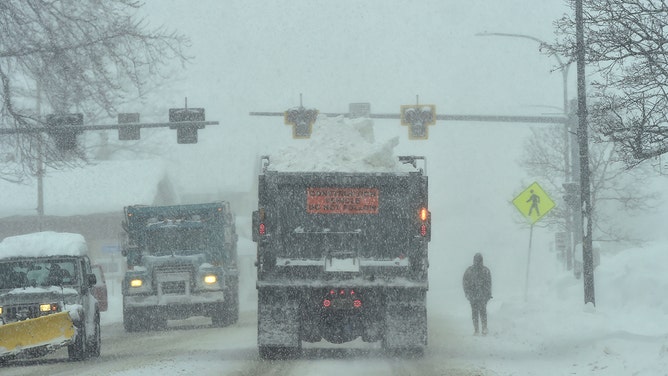 A dump truck carries heavy snow away from the city to be dumped elsewhere on January 18, 2024 in Lackawanna, New York.