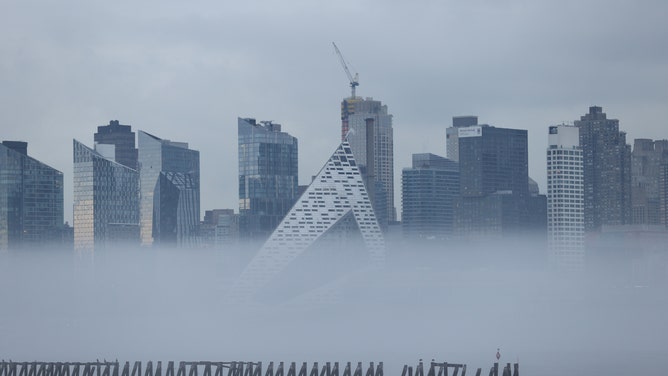 Fog shrouds Hudson River in New York City
