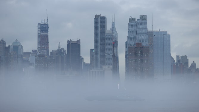 Fog shrouds Hudson River in New York City