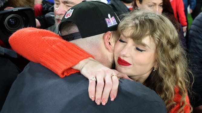 Travis Kelce #87 of the Kansas City Chiefs celebrates with Taylor Swift after a 17-10 victory against the Baltimore Ravens in the AFC Championship Game at M&T Bank Stadium on January 28, 2024 in Baltimore, Maryland.