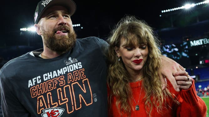 Travis Kelce #87 of the Kansas City Chiefs (L) celebrates with Taylor Swift after defeating the Baltimore Ravens in the AFC Championship Game at M&T Bank Stadium on January 28, 2024 in Baltimore, Maryland.