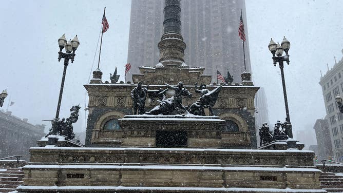 Snow falls in Cleveland, Ohio on Jan. 19, 2024.