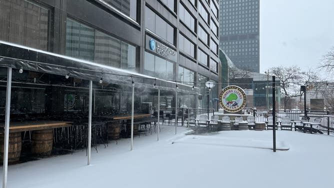 Snow falls in Cleveland, Ohio on Jan. 19, 2024.