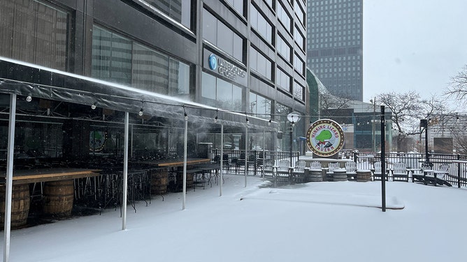 Snow falls in Cleveland, Ohio on Jan. 19, 2024.