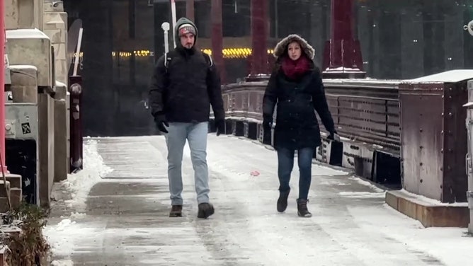 A winter storm system that affected the Midwest is now moving towards the east, but its impact still remains. Snow covered downtown Chicago on Saturday morning.