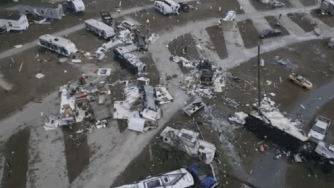 Aerial scenes showing suspected tornado damage in Marianna, Florida. Just before dawn a possible long-track tornado crossed I-10 and through a trailer park, flipping several trailers. The winds ripped off roofs, knocking powerlines down and trapping drivers.