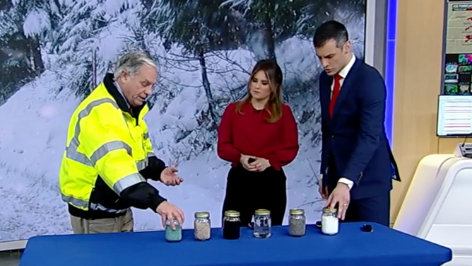 Tedesco shows FOX Weather meteorologists Jane Minar and Ian Oliver the different types of treatments used to keep roads clear of ice. Jan. 5, 2024.
