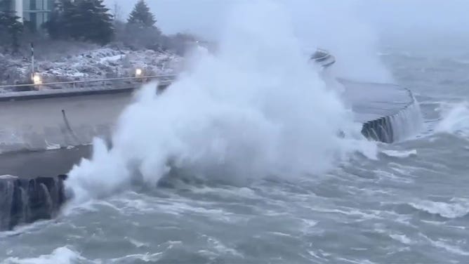 An angry Lake Michigan pounds against the shore in Chicago, Illinois, during a winter storm Jan. 12, 2024.