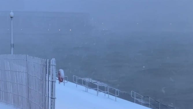 Snow obscures the view along Lake Michigan in Chicago, Illinois, during a winter storm Jan. 12, 2024.