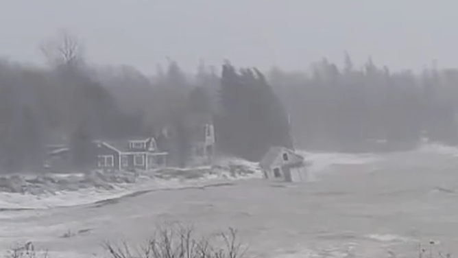 The cabin floating in the water.