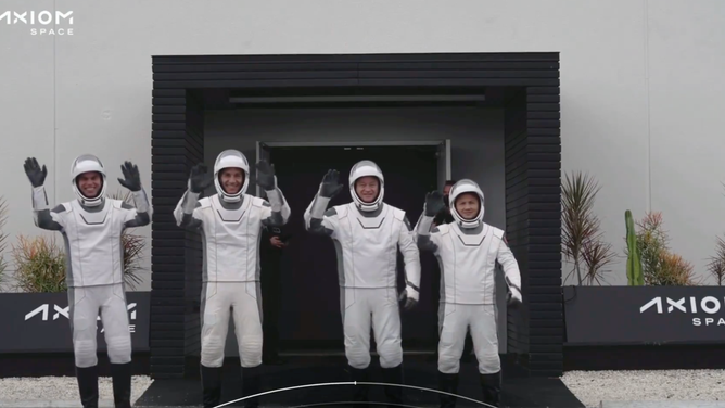 The Ax-3 crew walk out to get into Teslas and drive to KSC launchpad 39A.