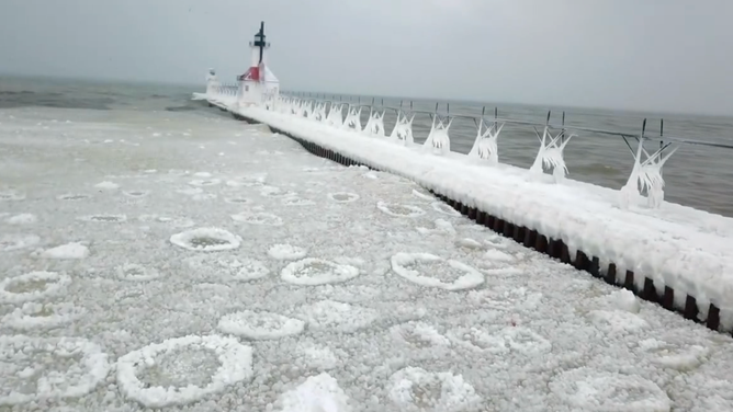 Pancake ice form next to the lighthouses.