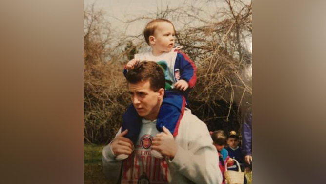 Copic, as a child, on his father's shoulders.