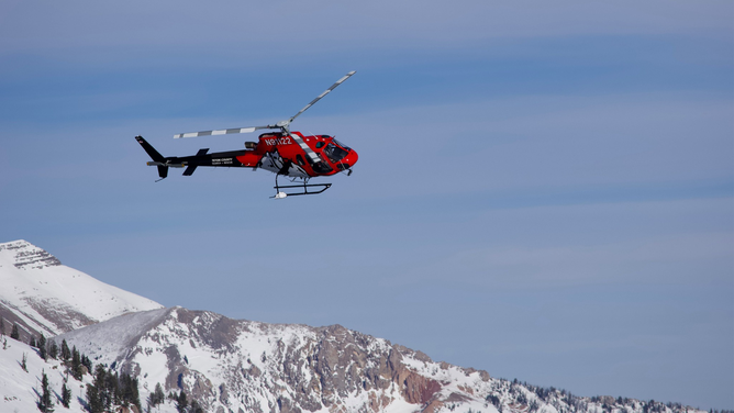 A photo showing a Teton County Search and Rescue helicopter in Wyoming.
