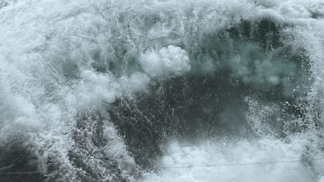 Images of waves hitting the ferry boat.