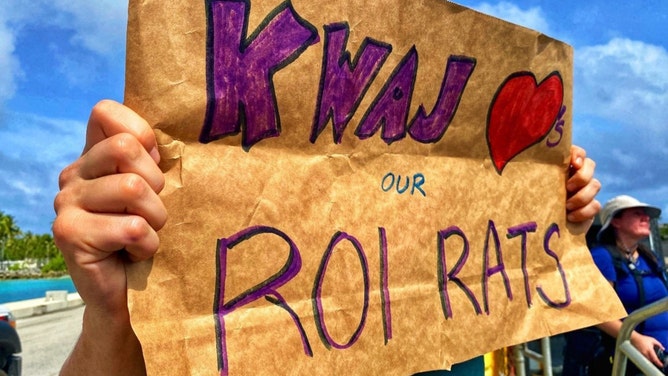 A Kwaj resident shows her support for the displaced individuals from Roi-Namur, who are affectionately called Roi Rats.