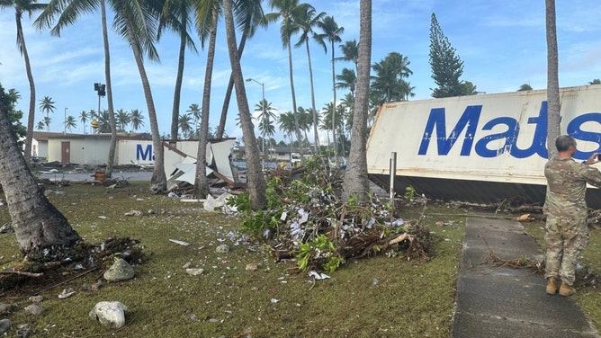 Containers were tossed across Roi-Namur by the storm surge.