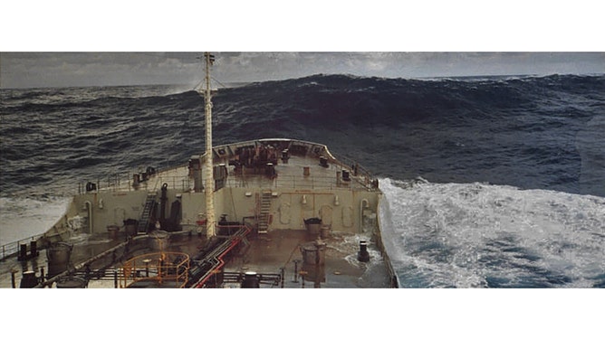 A rogue wave estimated at 60 feet in the Gulf Stream off of Charleston, South Carolina. At the time, surface winds were light at 15 knots, according to NOAA. The wave was moving away from the ship after crashing into it moments before this photo was captured.