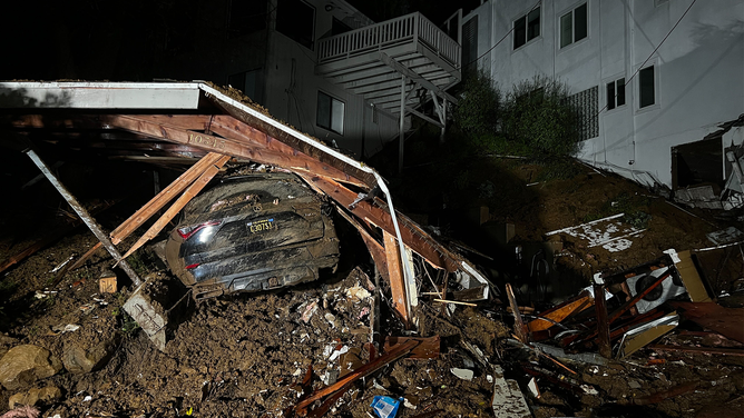 Mud and debris is seen in Beverly Glen, Los Angeles.