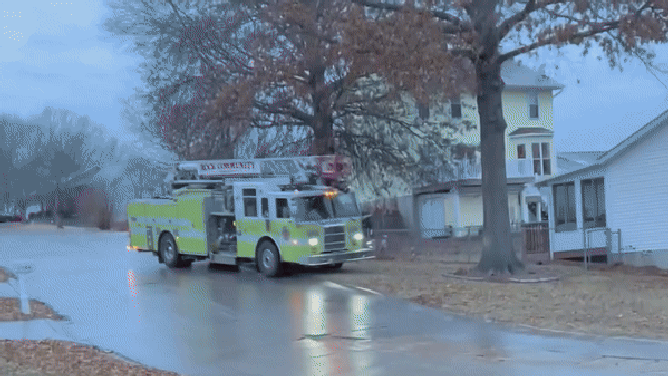 The fire truck spins on an icy neighborhood road in Imperial, Missouri. Jan. 22, 2025.