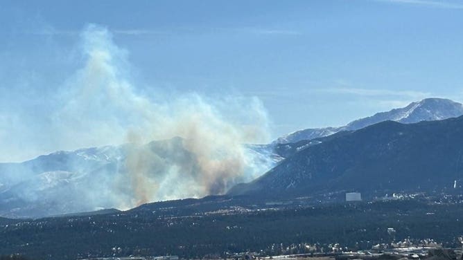 A grassfire burning on U.S. Air Force Academy grounds in Colorado Springs, Colorado on Sunday, February 25, 2024.
