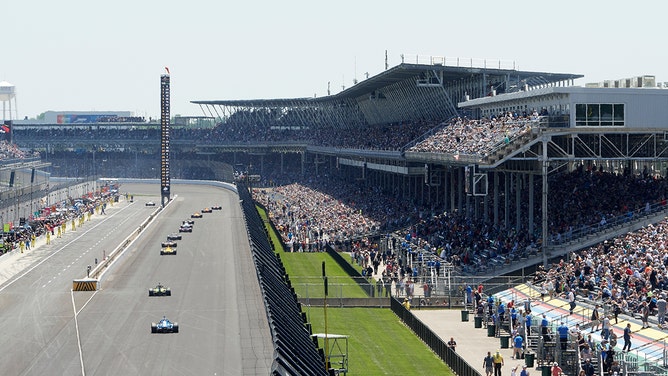 Aerial rear view of drivers in action during race at Indianapolis Motor Speedway on May 30, 2021.