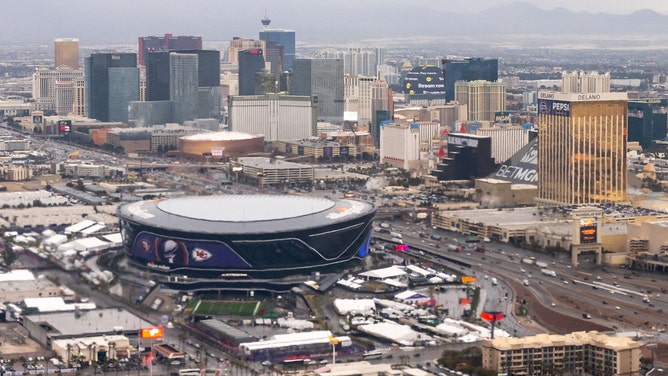 Allegiant Stadium, site of Super Bowl LVIII, is seen with the skyline of Las Vegas, Nevada, including hotels and casinos on Las Vegas Boulevard, known as the Las Vegas Strip, as seen from an airplane, February 5, 2024.