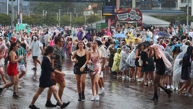 Taylor Swift fans, also known as "Swifties", brave wild weather outside Accor Stadium for Taylor Swift's first Sydney concert on February 23, 2024 in Sydney, Australia.