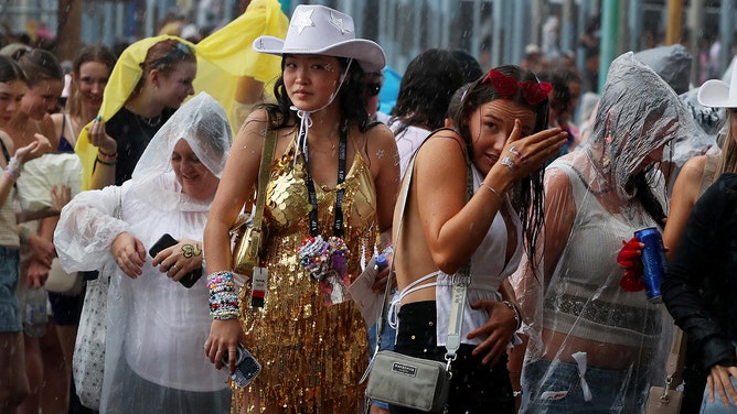Taylor Swift fans, also known as "Swifties", brave wild weather outside Accor Stadium for Taylor Swift's first Sydney concert on February 23, 2024 in Sydney, Australia.