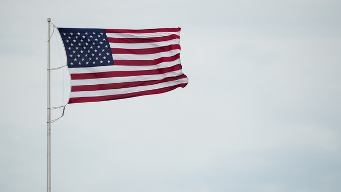 ORCHARD PARK, NY - OCTOBER 16: An American flag blows in the fierce winds during the game between the Buffalo Bills and the San Francisco 49ers on October 16, 2016 at New Era Field in Orchard Park, New York. Buffalo defeats San Francisco 45-16. (Photo by Brett Carlsen/Getty Images) *** Local Caption ***