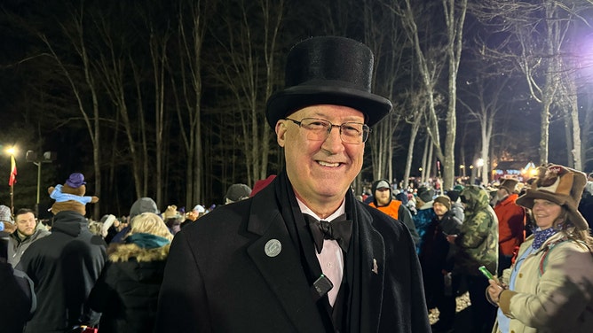 An estimated crowd of over 40,000 watches Punxsutawney Phil after he did not see his shadow predicting an early Spring during the 138th annual Groundhog Day festivities on Friday February 2, 2024 in Punxsutawney, Pennsylvania.