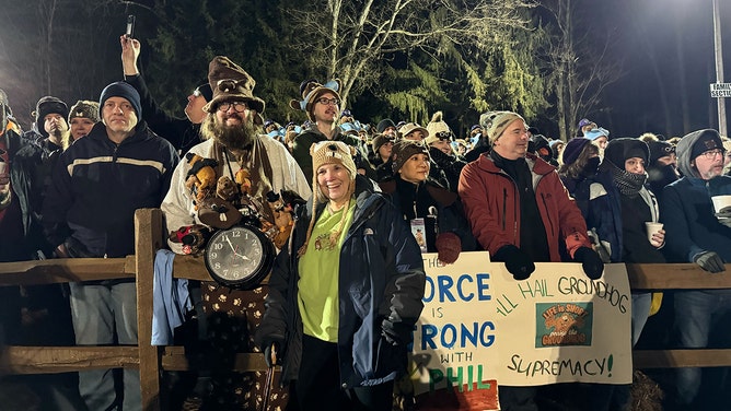 An estimated crowd of over 40,000 watches Punxsutawney Phil after he did not see his shadow predicting an early Spring during the 138th annual Groundhog Day festivities on Friday February 2, 2024 in Punxsutawney, Pennsylvania.