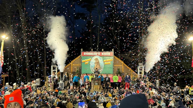 An estimated crowd of over 40,000 watches Punxsutawney Phil after he did not see his shadow predicting an early Spring during the 138th annual Groundhog Day festivities on Friday February 2, 2024 in Punxsutawney, Pennsylvania.