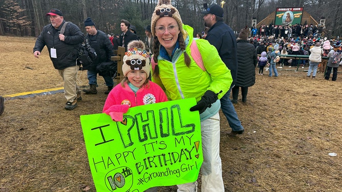 An estimated crowd of over 40,000 watches Punxsutawney Phil after he did not see his shadow predicting an early Spring during the 138th annual Groundhog Day festivities on Friday February 2, 2024 in Punxsutawney, Pennsylvania.