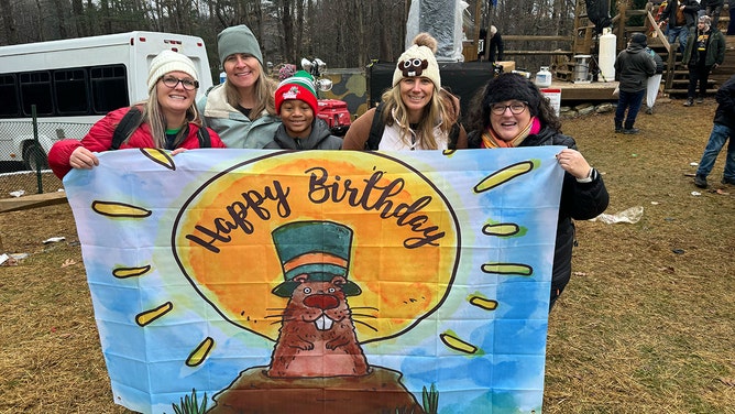 An estimated crowd of over 40,000 watches Punxsutawney Phil after he did not see his shadow predicting an early Spring during the 138th annual Groundhog Day festivities on Friday February 2, 2024 in Punxsutawney, Pennsylvania.