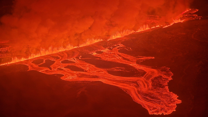 Lava is seen flowing from a volcano in Iceland on Thursday, Feb. 8, 2024.