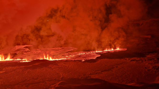 Lava is seen flowing from a volcano in Iceland on Thursday, Feb. 8, 2024.
