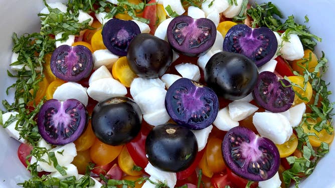 Purple tomatoes in a salad.