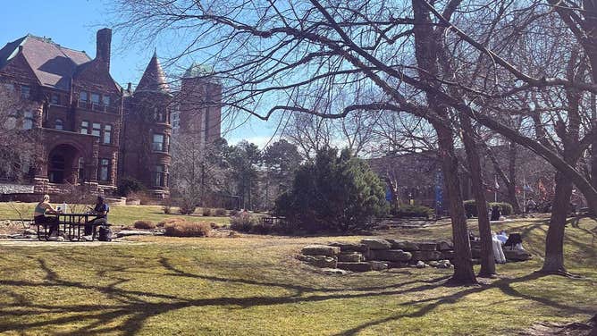 St. Louis University students enjoying 70-degree temperatures on Feb. 26, 2024.
