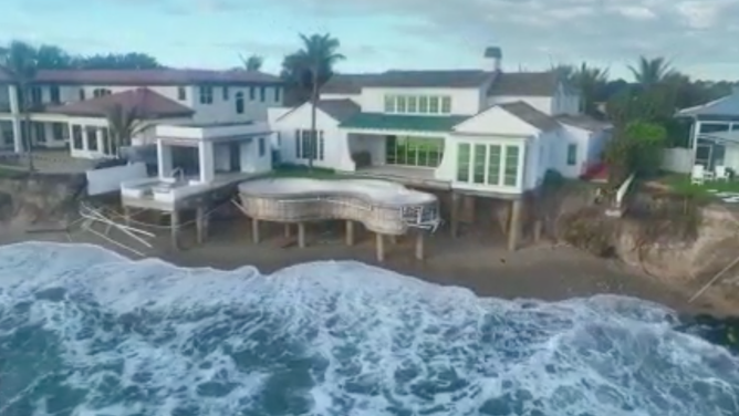 Damage to homes from beach erosion in Jupiter Inlet Colony, Florida. 