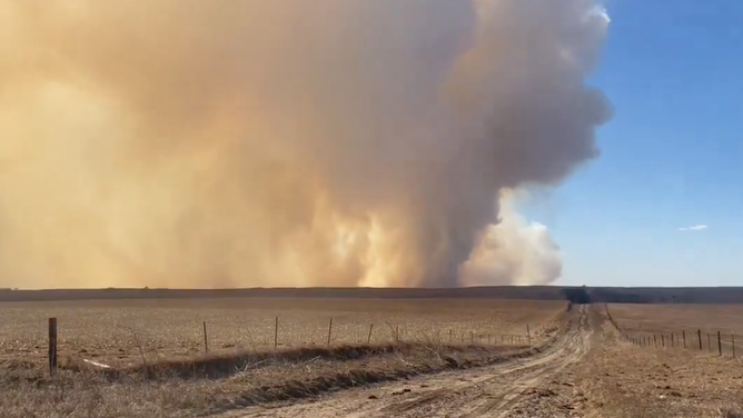 Smoke from a grassfire burning near the Custer-Lincoln County lines in Nebraska on February 26, 2024