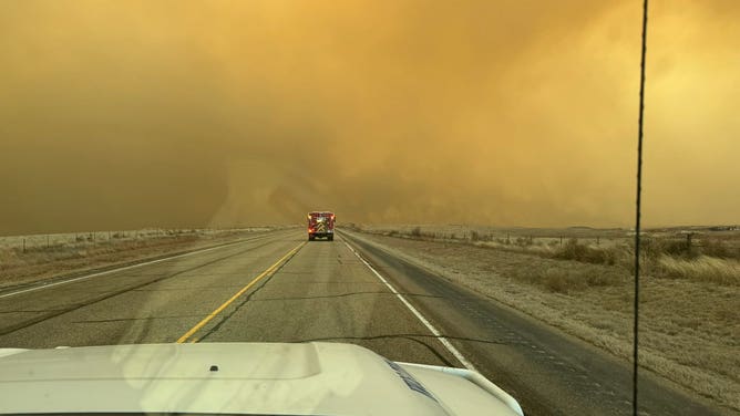 Photos show smoke from the Smokehouse Creek Fire burning in the Texas Panhandle on February 27, 2024.